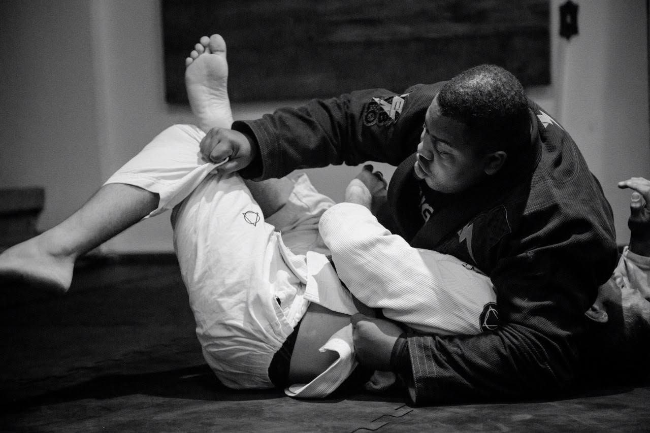 Technical Jiu-Jitsu training between master and student